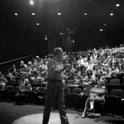 Photographer Steve Uzzell addresses a FotoWeekDC crowd. Washington, DC.